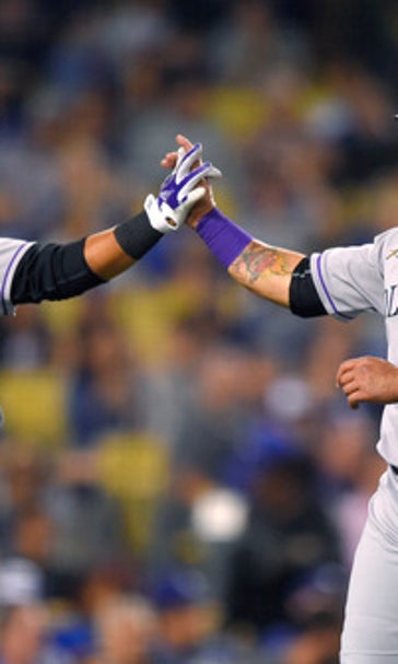 Rusin, Rockies throw 4-hitter in 1-0 win over Dodgers